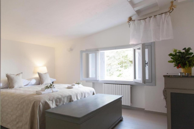 Bedroom with window at Villa Angela, located in Polignano a Mare